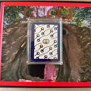 Vintage Gucci playing cards in acrylic case